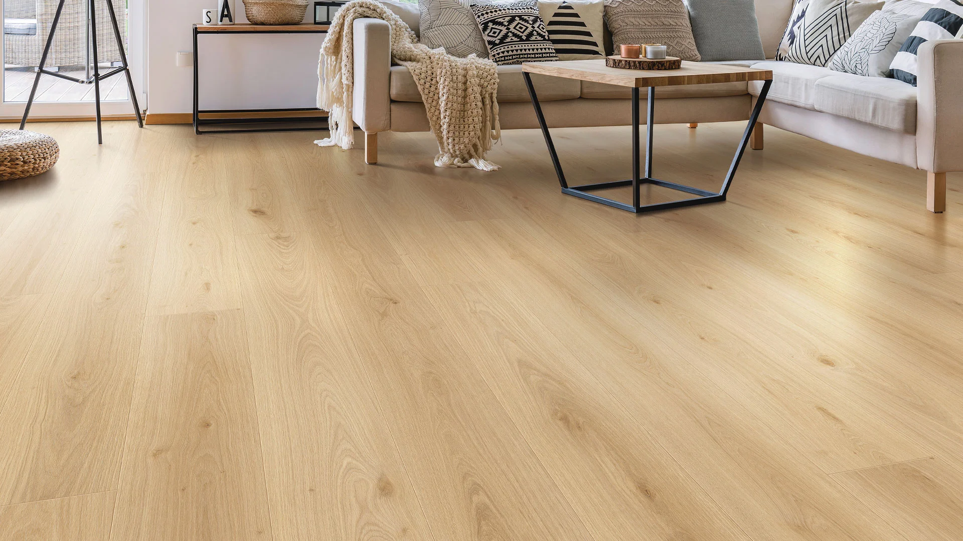 Sunlit Bakersfield living room with wide-plank light oak luxury vinyl flooring