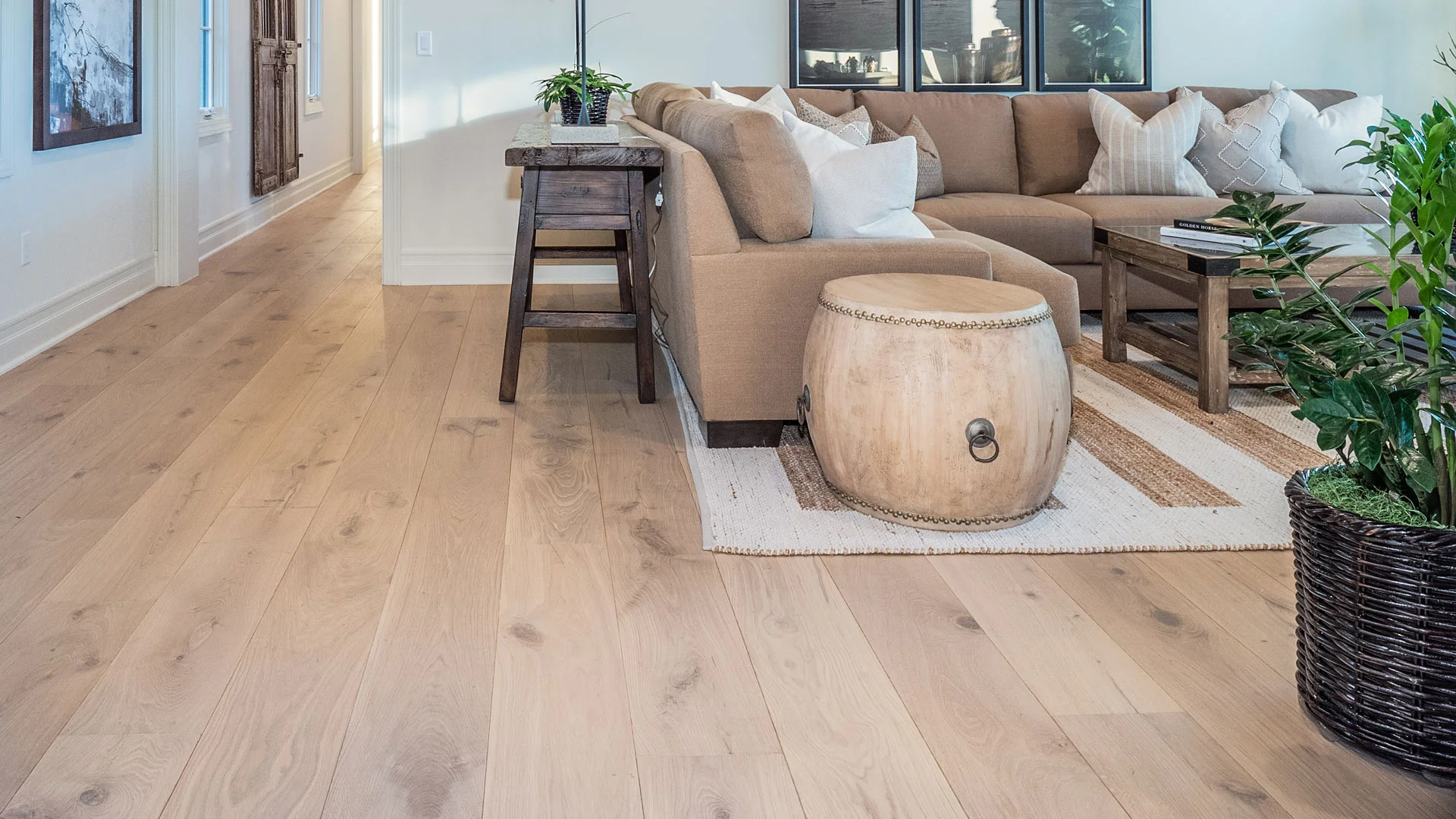 Finished living room with wide-plank oak luxury vinyl flooring